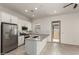 Contemporary kitchen with stainless steel appliances and granite countertops at 24478 N 166Th Ave, Surprise, AZ 85387