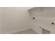 Empty laundry room with tile flooring and electrical outlets at 24478 N 166Th Ave, Surprise, AZ 85387