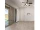 Open living space with sliding glass doors to the outdoor patio and backyard pool at 24478 N 166Th Ave, Surprise, AZ 85387