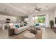 Open-concept living space with an eat-in kitchen and seamless access to a private backyard pool at 24478 N 166Th Ave, Surprise, AZ 85387