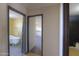 Bathroom featuring a claw foot bathtub with a view of the bedroom at 270 S Ralston Rd, Maricopa, AZ 85139