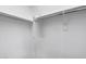 Bright and spacious closet featuring closet rods for efficiently organizing clothes and maximizing storage at 2941 E Darrow St, Phoenix, AZ 85042