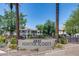 Attractive community sign featuring '2830 Hunter Ridge II' and palm trees in a neighborhood entrance at 2941 E Darrow St, Phoenix, AZ 85042