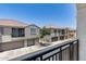 Exterior street view of townhomes with private garages, patios and tile roofs at 2941 E Darrow St, Phoenix, AZ 85042