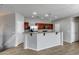 Kitchen with a breakfast bar, hardwood floors and stainless steel appliances at 2941 E Darrow St, Phoenix, AZ 85042