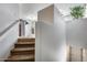 View of the carpeted staircase with an open floor plan visible in the background at 2941 E Darrow St, Phoenix, AZ 85042