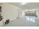 Clean, spacious two-car garage with painted floor, and ample storage space at 29828 N 72Nd Ln, Peoria, AZ 85383