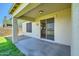 Covered patio with sliding glass door entry, perfect for outdoor relaxation at 29828 N 72Nd Ln, Peoria, AZ 85383