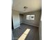 This cozy bedroom features sleek wood floors, neutral tones, and ample natural light from a well-placed window at 300 S Val Vista Dr # 17, Mesa, AZ 85204