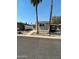 Attractive single-story home featuring a convenient carport and low-maintenance landscaping, showcasing a practical outdoor space at 300 S Val Vista Dr # 17, Mesa, AZ 85204