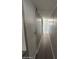 Hallway with new flooring and door at 300 S Val Vista Dr # 17, Mesa, AZ 85204