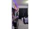 Bedroom with black furniture and LED lights at 31138 N 130Th Ln, Peoria, AZ 85383