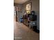 Well-lit dining area showcasing decorative accents, built-in storage, and convenient access to kitchen appliances at 31138 N 130Th Ln, Peoria, AZ 85383