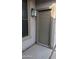 Close up of the front door with outdoor lantern lighting and painted trim at 31138 N 130Th Ln, Peoria, AZ 85383