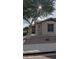 Charming home with desert landscaping, a shade tree, and sidewalk appeal at 31138 N 130Th Ln, Peoria, AZ 85383
