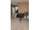 Open-concept room featuring a comfortable seating area, light carpet and connections to other rooms at 31138 N 130Th Ln, Peoria, AZ 85383