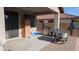 Back patio with a barbeque grill and furniture, perfect for outdoor dining and relaxing at 31138 N 130Th Ln, Peoria, AZ 85383
