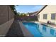 Backyard pool features a refreshing escape, set against a private and enclosed outdoor space at 31138 N 130Th Ln, Peoria, AZ 85383