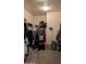 Spacious walk-in closet provides ample storage with racks and shelving for clothes and accessories at 31138 N 130Th Ln, Peoria, AZ 85383