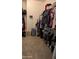 Organized walk-in closet featuring ample hanging space and shelving for clothing and accessories at 31138 N 130Th Ln, Peoria, AZ 85383