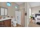 Bathroom with tub/shower combination and vanity with modern fixtures at 3125 W Desert Ln, Laveen, AZ 85339