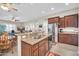 Modern kitchen with stainless steel appliances and granite countertops at 3125 W Desert Ln, Laveen, AZ 85339