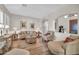 Spacious living room featuring wood floors and neutral decor at 3125 W Desert Ln, Laveen, AZ 85339