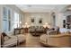 Elegant living room with hardwood floors, neutral color scheme, and stylish decor at 3125 W Desert Ln, Laveen, AZ 85339
