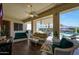 Cozy covered patio with elegant seating, ideal for enjoying the outdoor ambiance at 3125 W Desert Ln, Laveen, AZ 85339