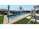 A tranquil backyard with in-ground pool, desert landscaping and privacy wall at 3125 W Desert Ln, Laveen, AZ 85339
