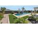 A beautiful backyard featuring a pool and meticulously manicured landscaping at 3125 W Desert Ln, Laveen, AZ 85339