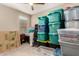 Bedroom filled with plastic moving boxes and storage containers at 35919 N Loemann Dr, San Tan Valley, AZ 85143