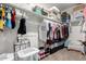 Walk-in closet with built-in shelving and ample storage space for clothing and accessories at 35919 N Loemann Dr, San Tan Valley, AZ 85143