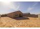 Large backyard with perimeter block fence offers space for recreation and landscaping opportunities at 36987 N Sidewinder Dr, San Tan Valley, AZ 85140