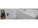 Convenient laundry area with white appliances and linen storage space for organization at 36987 N Sidewinder Dr, San Tan Valley, AZ 85140