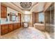 Beautiful bathroom with decorative lighting, large shower, and tub at 41667 N 113Th Pl, Scottsdale, AZ 85262