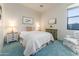 Cozy bedroom with two nightstands and floral-patterned armchair at 41667 N 113Th Pl, Scottsdale, AZ 85262