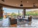 Inviting outdoor living space with comfortable seating and desert views, ideal for relaxation and entertaining at 41667 N 113Th Pl, Scottsdale, AZ 85262