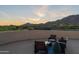 Rooftop deck featuring seating and views of the surrounding mountains and desert at 41667 N 113Th Pl, Scottsdale, AZ 85262