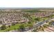 Expansive residential area featuring well-spaced homes, green spaces, and a network of roads for easy access at 45042 W Cypress Ln, Maricopa, AZ 85139