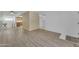 Spacious living room boasting hard surface floors that lead to an updated kitchen at 461 W Holmes Ave # 180, Mesa, AZ 85210