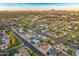 Scenic aerial view of a residential area with tree-lined streets and mountain views in the distance at 4610 N 14Th Ave, Phoenix, AZ 85013