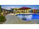 Beautiful backyard featuring a pool, patio with ample seating, and built-in BBQ for relaxation and entertainment at 4610 N 14Th Ave, Phoenix, AZ 85013