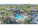 Aerial view of the community pool, hot tub, lounge area, and landscaping at 4700 S Fulton Ranch Blvd # 11, Chandler, AZ 85248