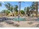 A small community hot tub has lounge chairs and tropical landscaping at 4700 S Fulton Ranch Blvd # 11, Chandler, AZ 85248