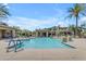 A community pool offers sunning, seating, and lush landscaping at 4700 S Fulton Ranch Blvd # 11, Chandler, AZ 85248