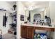 The bathroom features a large mirror, vanity, and walk-in closet at 4957 W Onyx Ave, Glendale, AZ 85302