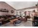 Comfortable living room with vaulted ceilings, flowing into the dining area and kitchen at 4957 W Onyx Ave, Glendale, AZ 85302