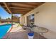 Inviting pool area with a covered patio, perfect for relaxing and entertaining at 4957 W Onyx Ave, Glendale, AZ 85302