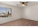 Bedroom featuring a window and a ceiling fan at 6102 E Danbury Rd, Scottsdale, AZ 85254